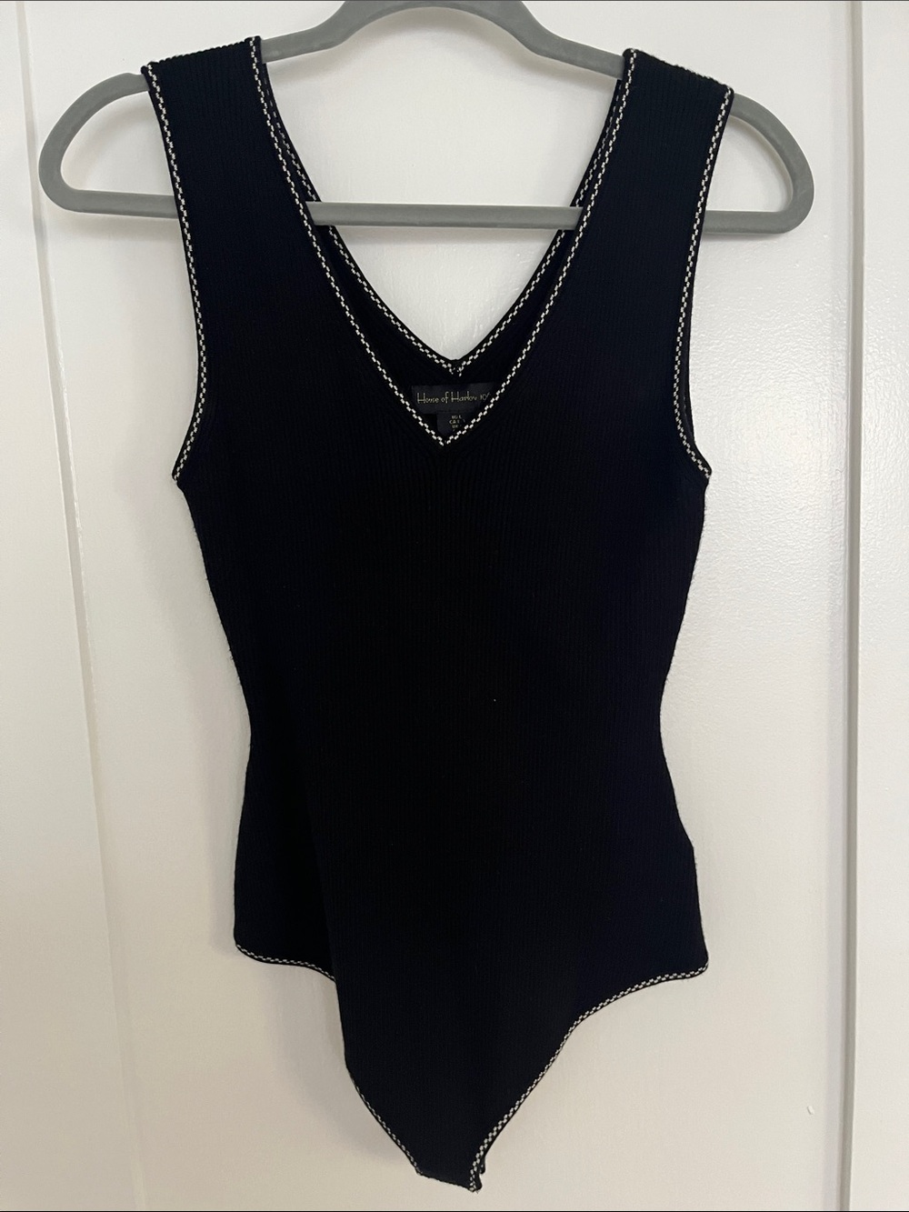 House of Harlow 1960 Black V-Neck Ribbed Bodysuit with White Contrast Stitching